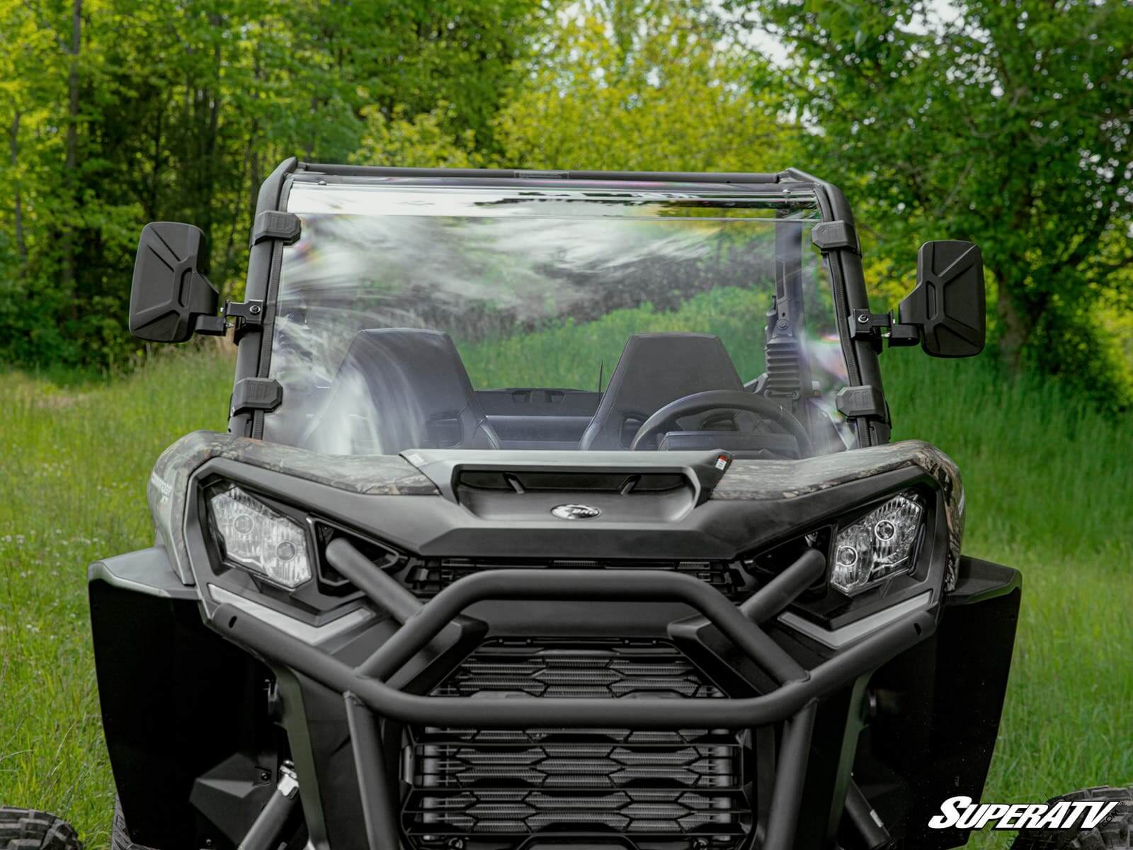 Front view of a rugged off-road vehicle with a protective grille.