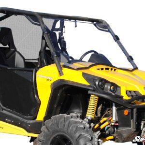 Yellow off-road side-by-side vehicle with large tires and roll cage.