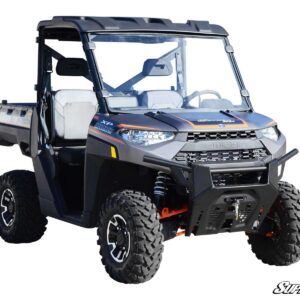 Blue off-road utility vehicle with rugged tires and protective frame.