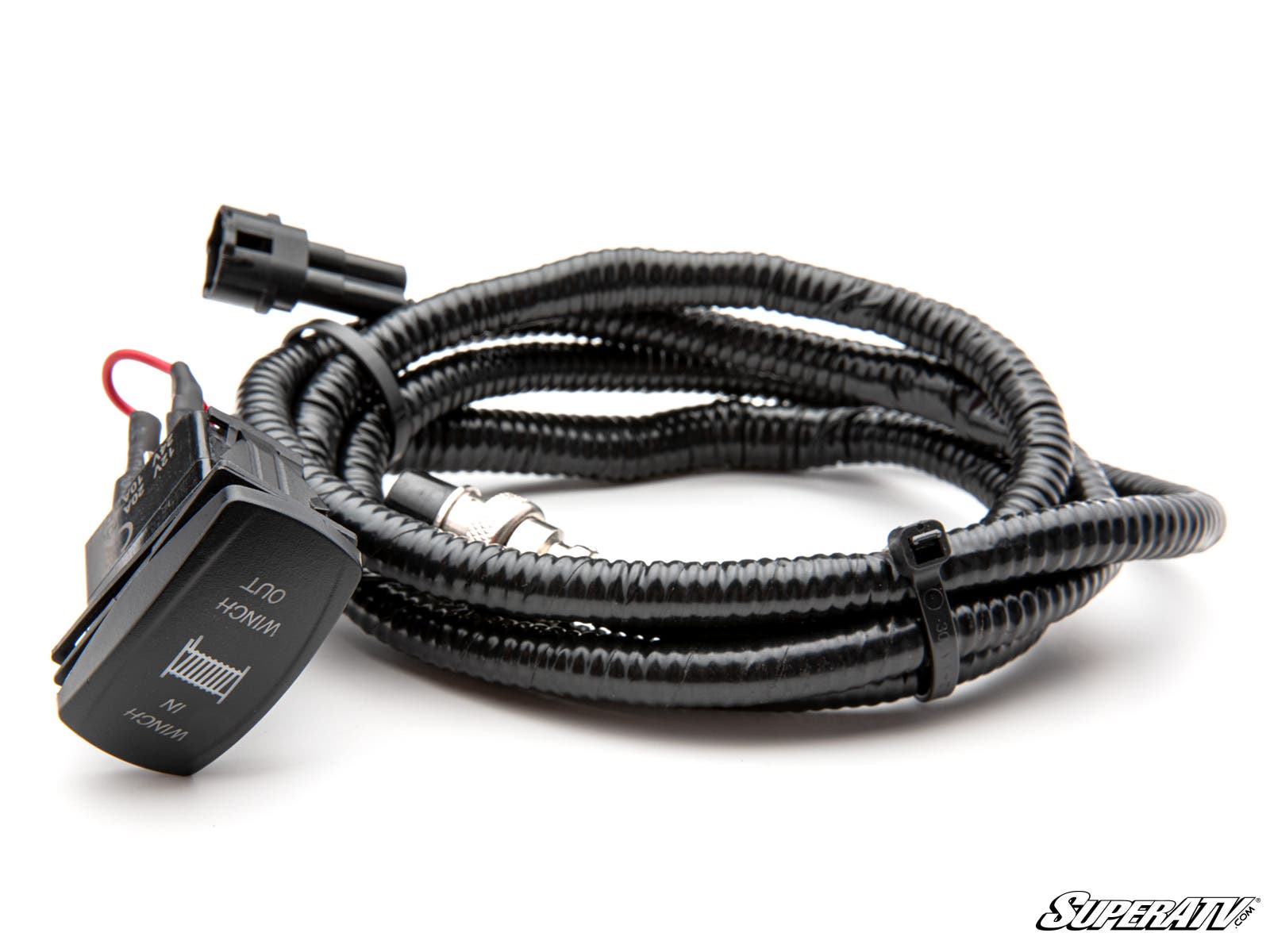 Coiled black automotive wiring harness with connectors.