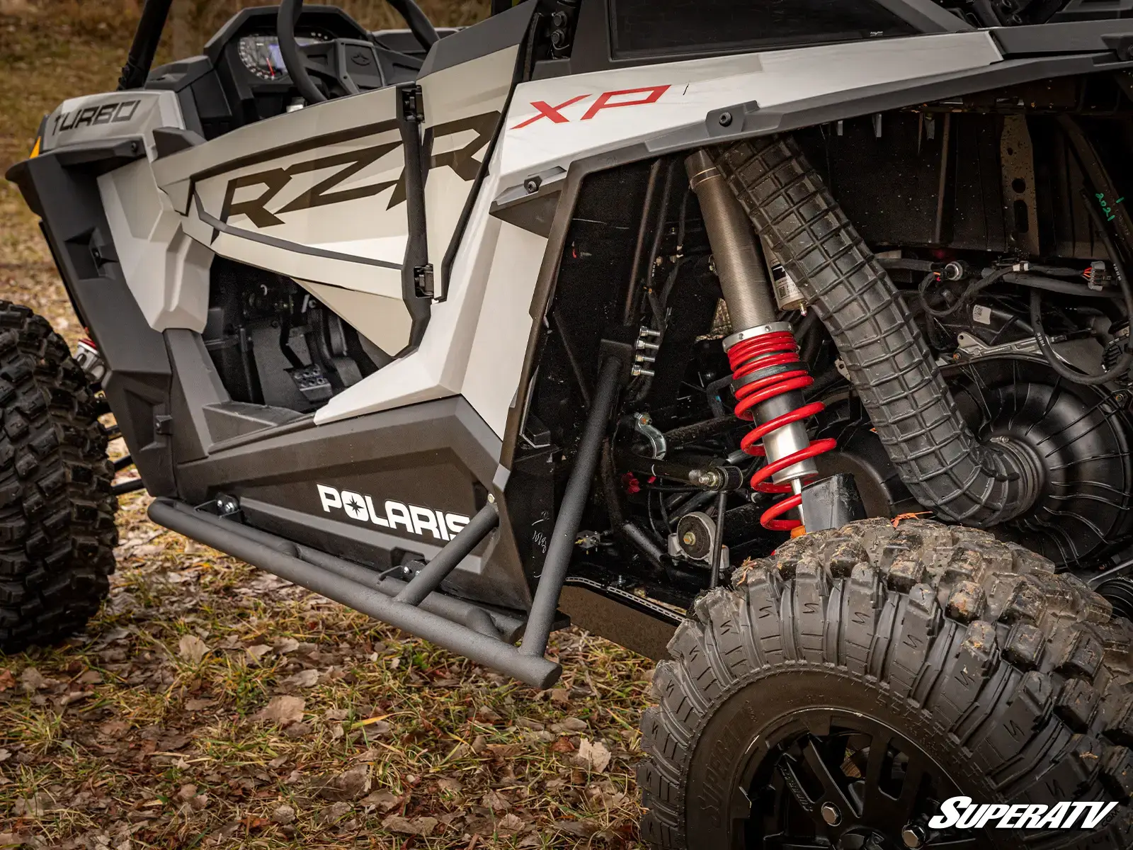 Off-road vehicle with rugged suspension system.