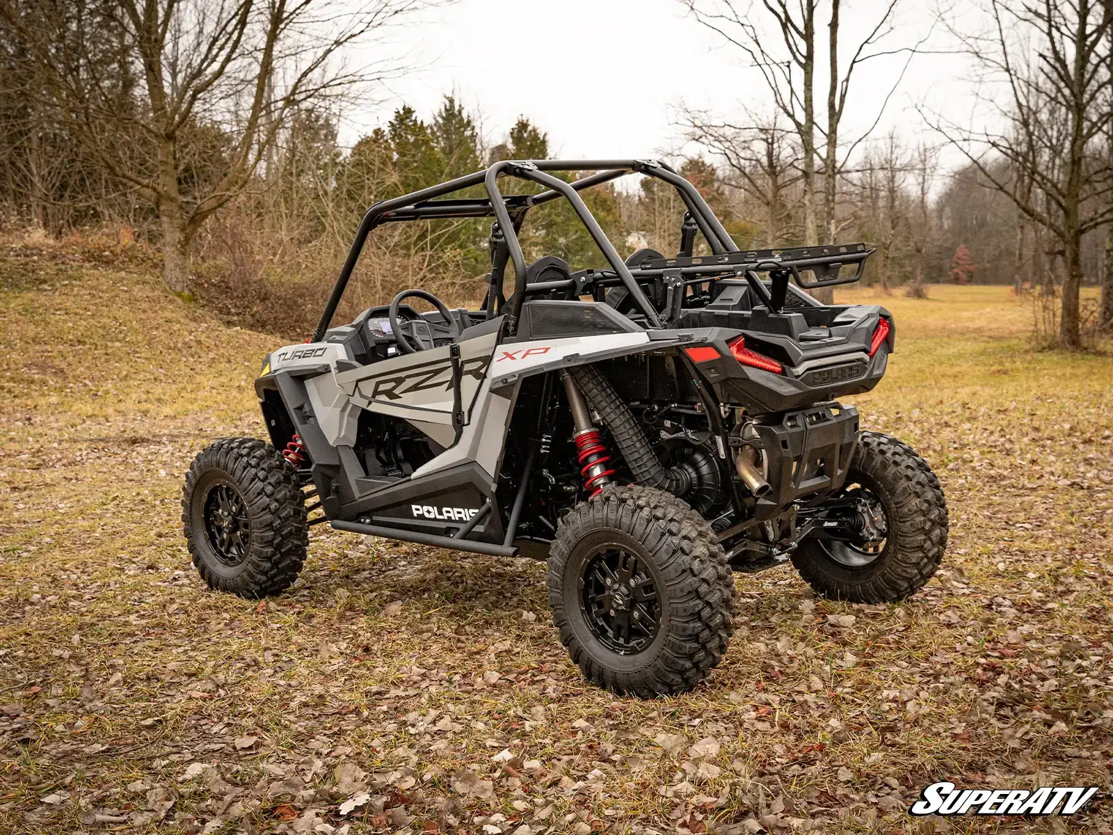 Off-road vehicle in a wooded area.