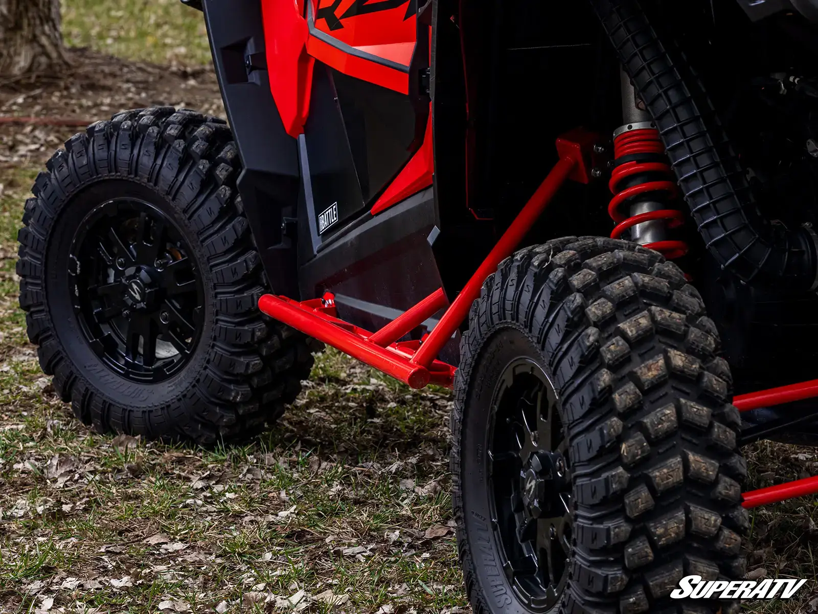 Off-road vehicle with rugged black tires.