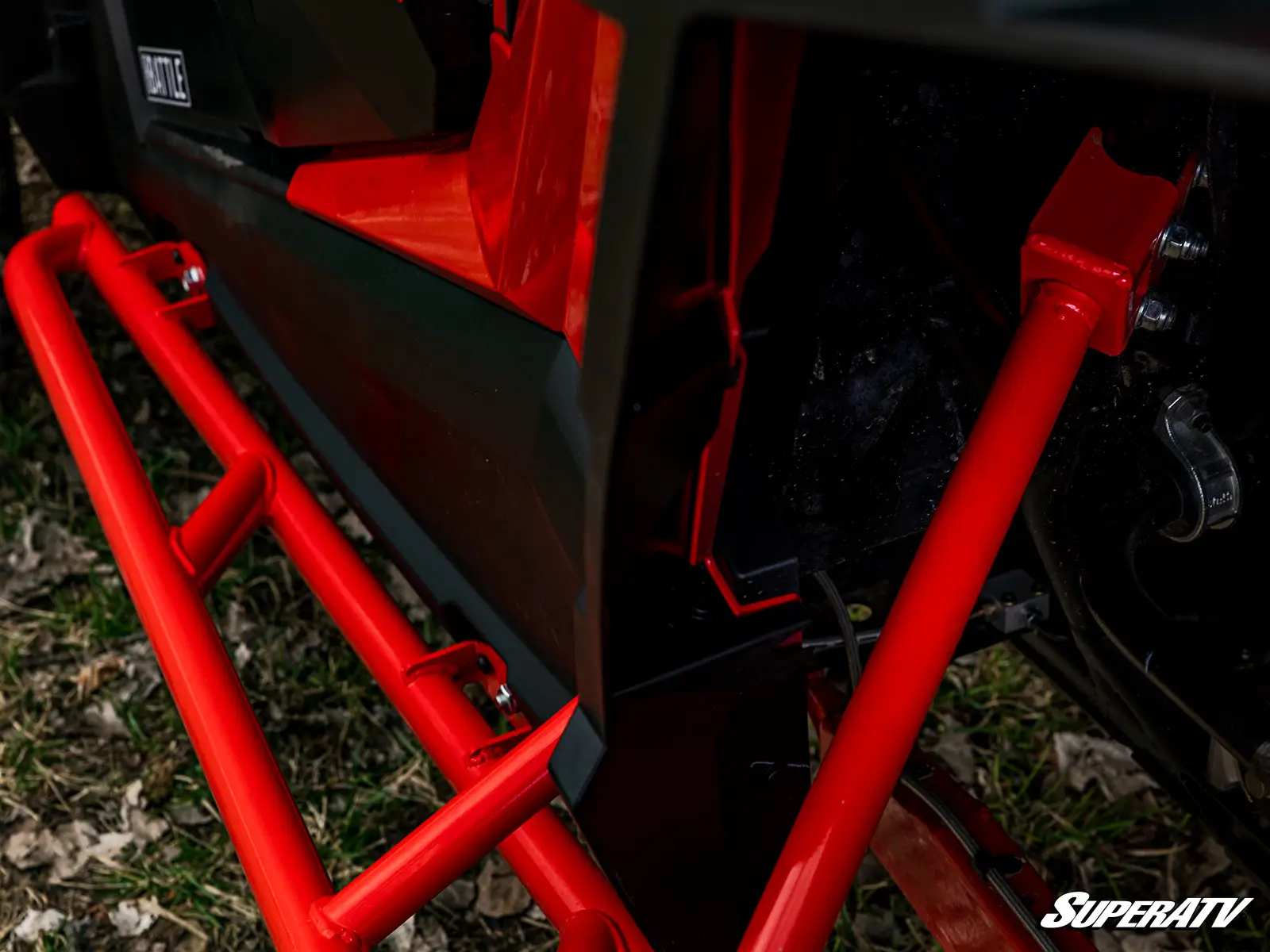 Red off-road vehicle frame and bars.