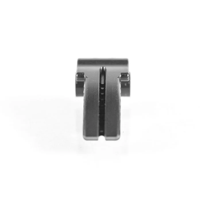 Black plastic T-shaped object on white background.
