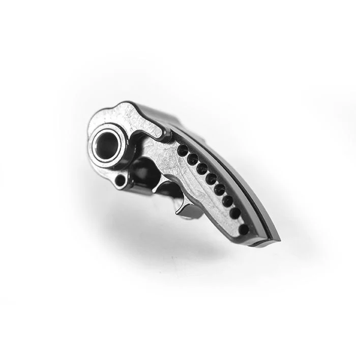 Metallic gear part with intricate design.