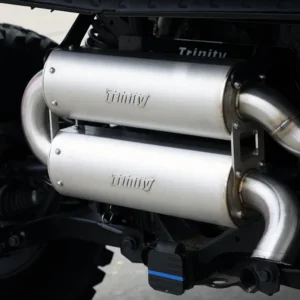 Dual stainless exhaust mufflers on off-road vehicle