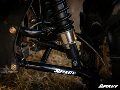 ATV suspension system with SuperATV branding.