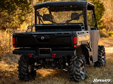 Off-road vehicle in a wooded area.